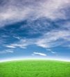 Beautiful blue sky with green hill background