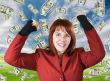 Girl rejoicing a win with dollars falling from the sky
