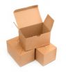 three cardboard boxes on white