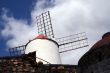 Windmill over blue sky