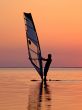 Silhouette of a wind-surfer on a sunset 3