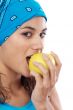 Woman eating apple