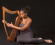 African-American woman with harp