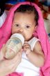 Baby drinking a bottle