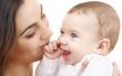 smiling baby in mother hands