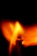 Match with smoke isolated in dark background