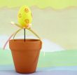 Decorated Yellow Eggs on Pastel Background