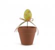 Isolated Yellow Easter Egg in Flower Pot