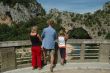 Tourists watching a Rock Bridge