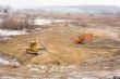 Excavator and buldozer prepare platform before construction