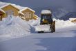 Snowplow clearing streets