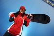 young adult female snowboarder