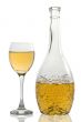 Wineglass and bottle with white wine