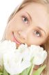 happy girl with white tulips