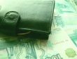 The purse laying on banknotes of Russia