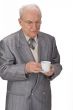 Senior man with tea cup