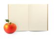 exercise book and apple