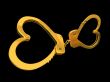 Handcuffs-heart isolated on black background