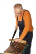 man is sawing