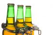 Beer and Handcuffs - Drunk Driving Concept
