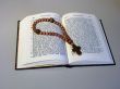 rosary on book