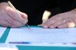 Businessman is signing a contract