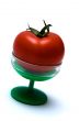 Juicy Isolated Tomato on a green suppot