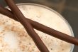 Cup of latte with chocolate sticks