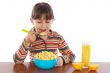 Girl eating breakfast