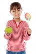 Girl with lollipop and apple