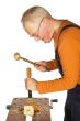 chiseling and carving the wood