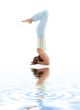 supported headstand on white sand 2