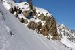 Boulders on snowy mountain
