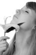 young girl smelling lily