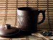 Cup of tea with tea leafs 2