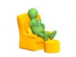  3d puppet, having a rest in a soft armchair