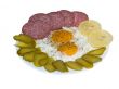 Fried eggs with salami, lemon and pickles