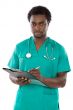 Young black doctor writing