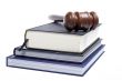 Wooden gavel and law books