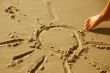 Sun drawing on sand