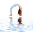 urdhva dhanurasana upward bow pose on white sand