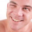 Young man blinking