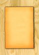 paper against wooden background