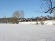Small village near frozen lake