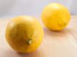 Two lemons on a table