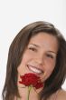 A smile behind a rose