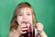 child drinking juice