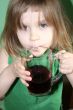 child drinking juice