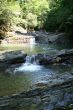 bathing in small waterfalls in granite coast