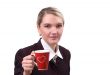 Portrait of the business woman with a red cup
